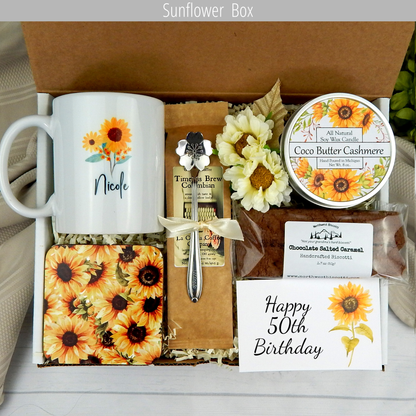 Sunflower themed 50th birthday gift basket with custom name mug, coffee, and an assortment of treats.