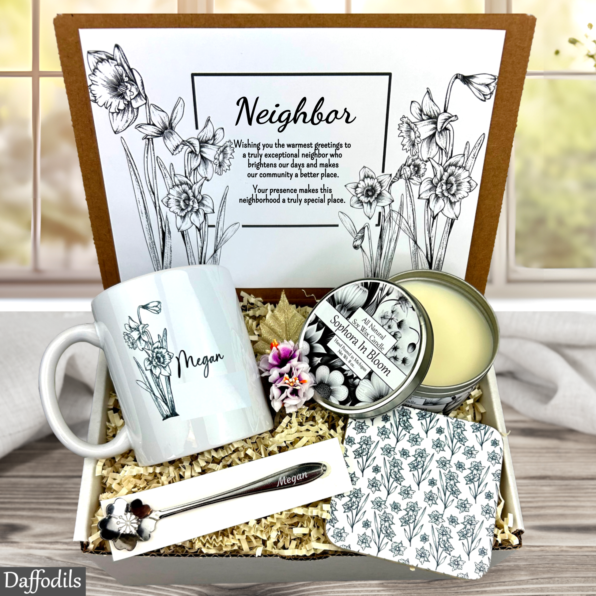 Neighbor gift set with mug, candles, and coasters in a decorative box.