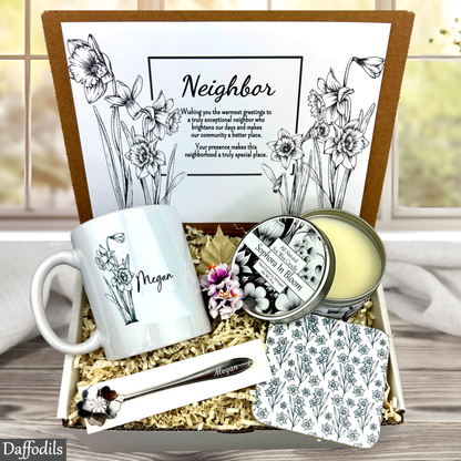 Neighbor gift set with mug, candles, and coasters in a decorative box.