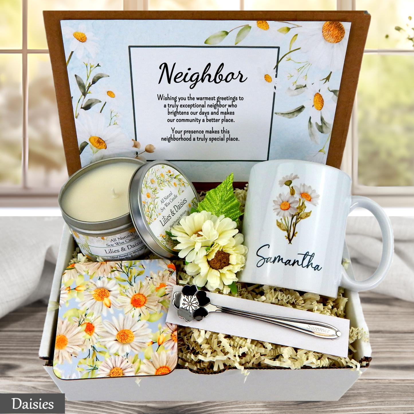 Neighbor gift set with mug, candle, and floral elements in a decorative box.
