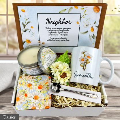 Neighbor gift set with mug, candle, and floral elements in a decorative box.