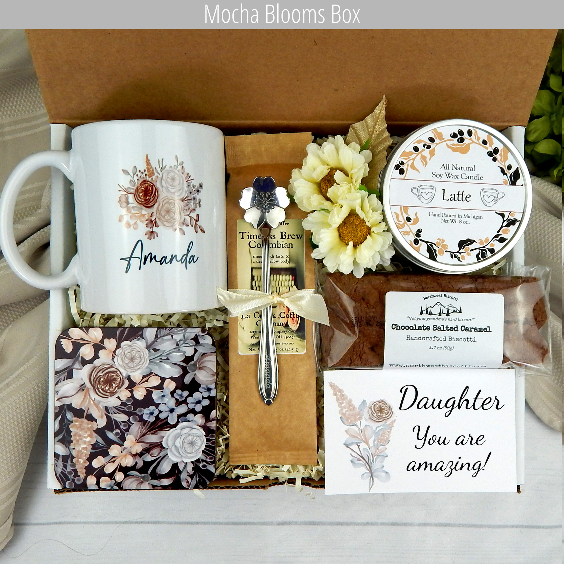 Coffee and loving moments: Women's daughter's gift box filled with gourmet coffee, a customized name mug, candle, engraved spoon, and biscotti.