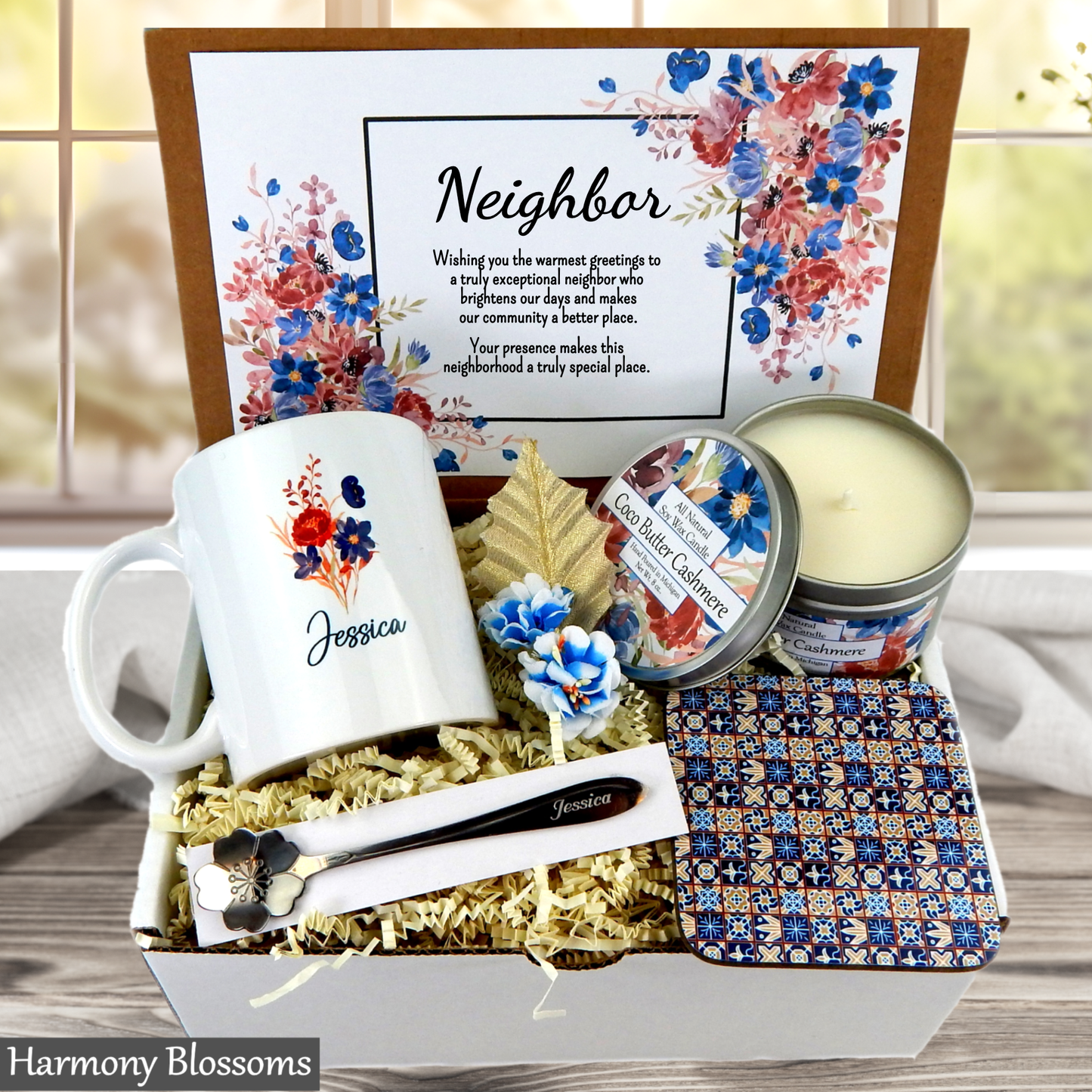 Neighbor gift set with mug, candle, and decorative items in a box.