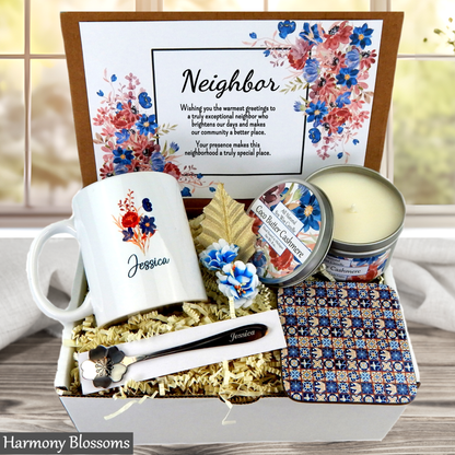 Neighbor gift set with mug, candle, and decorative items in a box.