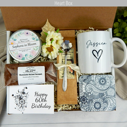 Sweet surprises: Women's 60th birthday gift basket with coffee, a customized mug, and delectable treats.