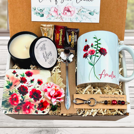 merlot flower gift basket with personalized mug, candle, engraved spoon, matching coaster and scented candle.