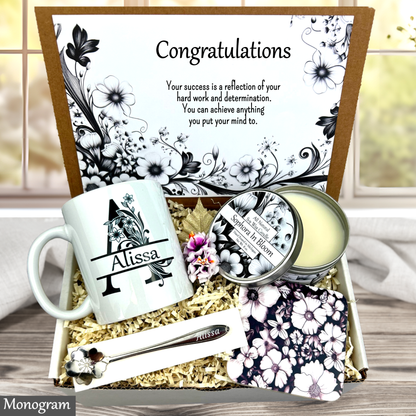 Monogram letter mug congratulations Gift set with mug, candles, and decorative items on a wooden surface.