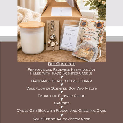List of gift box contents. Gift box with candle, beaded charm, and other items on a wooden surface.