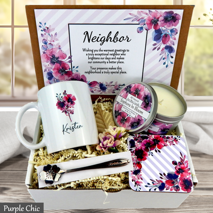 Neighbor gift set with mug, candle, and other items in a decorative box.