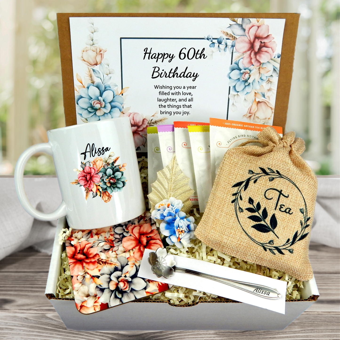 Meaningful 60th birthday care package for tea lover with an engraved spoon and custom name mug