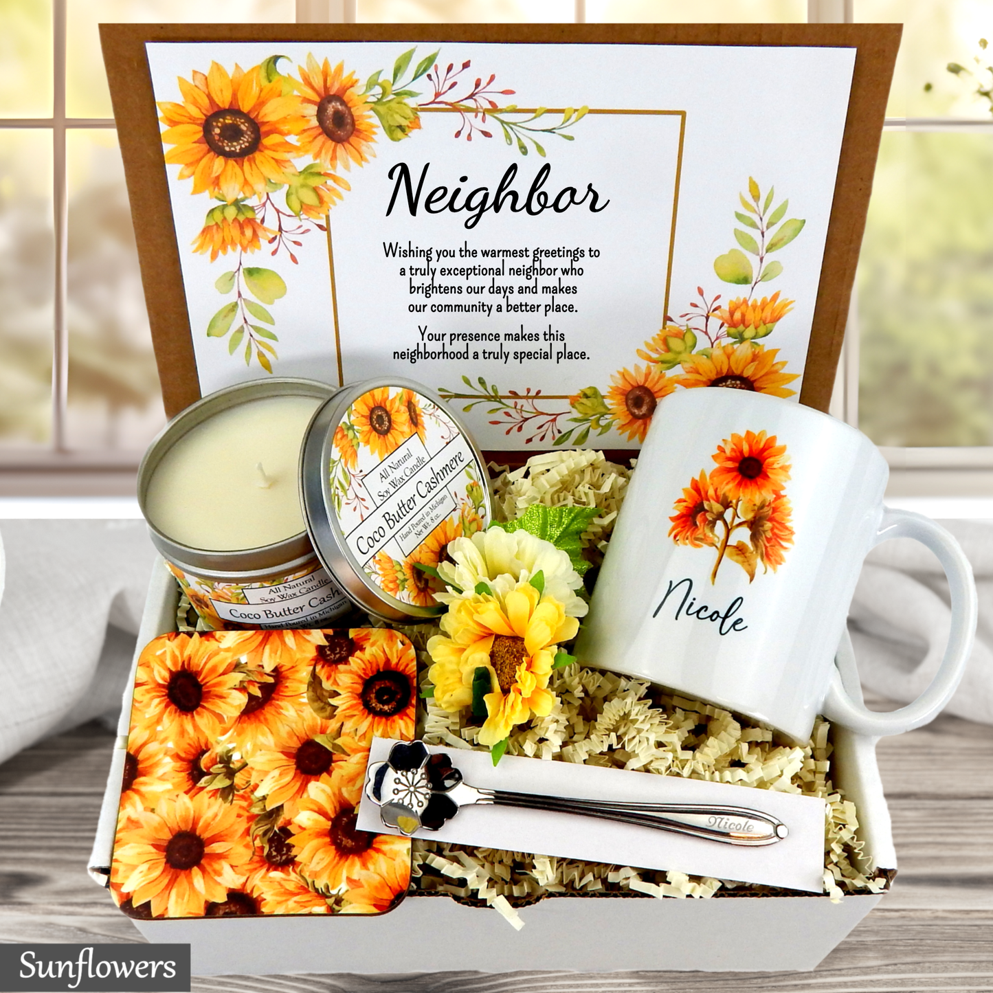 Neighborhood gift set with sunflower-themed items including a mug, candle, and card.