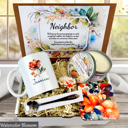 Neighbor gift set with mug, candles, and flowers in a decorative box.