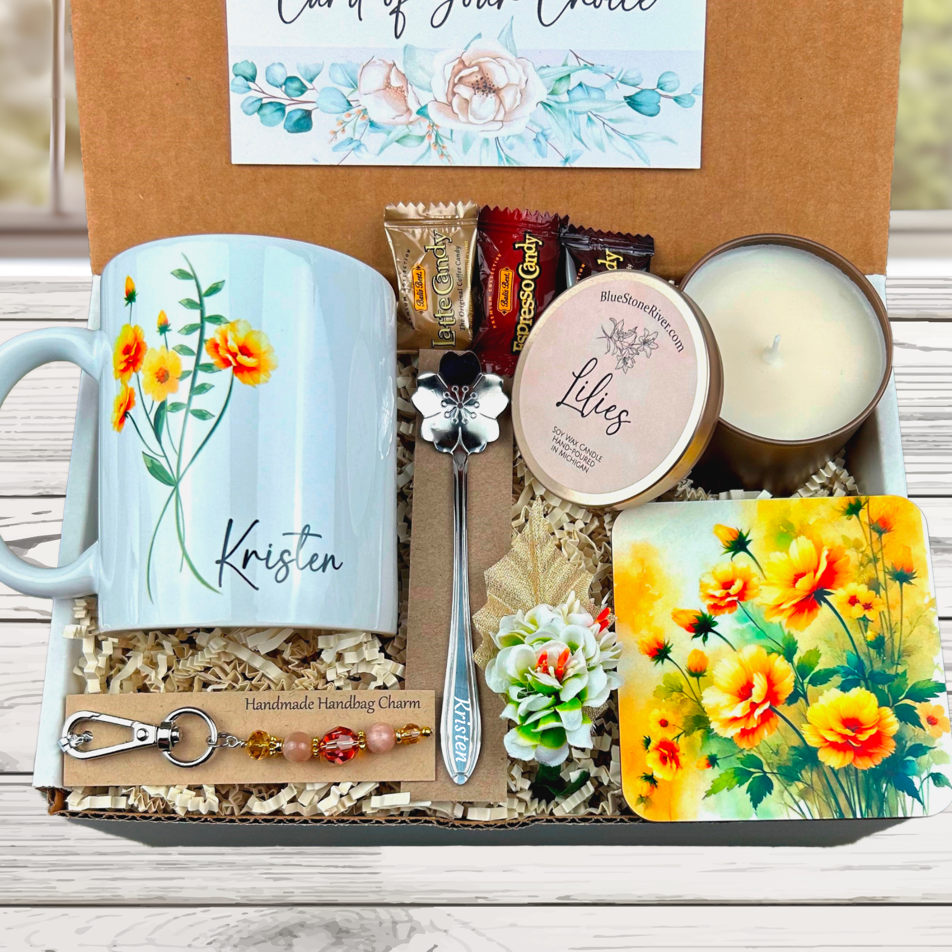 yellow flower gift basket with personalized mug, candle, engraved spoon, matching coaster and scented candle.