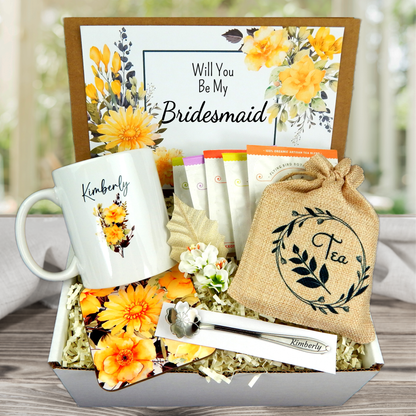 bridesmaid proposal box with assorted tea and yellow floral tea cup